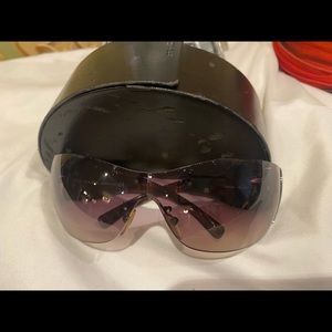 original Prada sunglasses with silver designs on sides